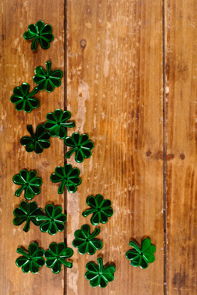 shamrocks cutouts on a wooden floor